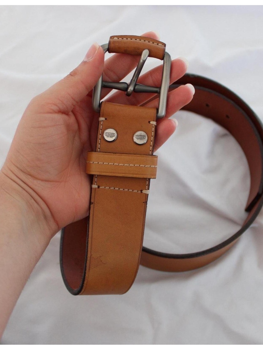 Vintage Coach Tan leather belt with silver buckle.